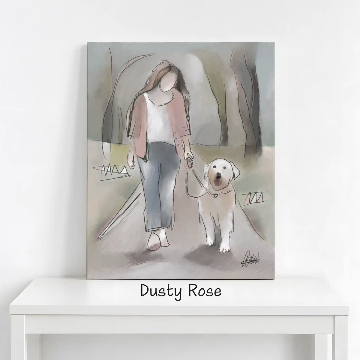 A watercolor-style canvas print leaning on a white table against a white wall. The artwork depicts a woman in a pink cardigan and blue jeans walking a white dog on a leash in a park.