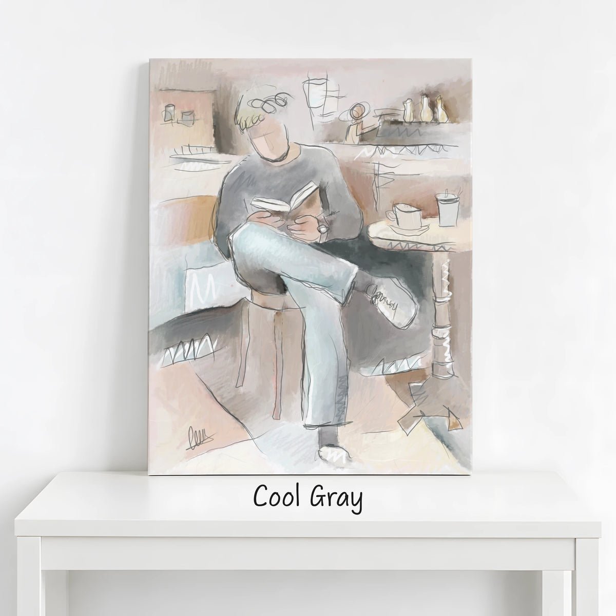 A vertical canvas art print depicting an expressive sketch art of a person sitting and reading, leaning against a white wall on a white table. The print features a cool gray and beige palette, and the text 'Cool Gray' is written below it.